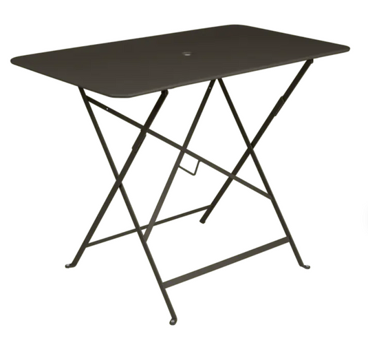 Fermob Tonka brown metal foldable bistro table, 97x57 cm, outdoor cafe table with a honey finish and sturdy design.