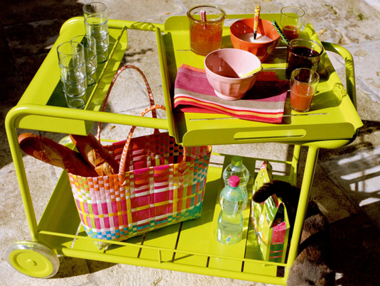 Fermob Luxembourg Side Bar trolley with wheels, designed for restaurant terrace drinks service, featuring a modern table with a sleek surface.