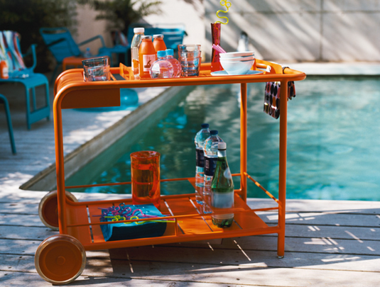 Fermob Luxembourg side bar trolley with wheels, perfect for restaurant terrace drinks service and outdoor dining.