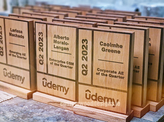 Custom Wooden Awards by Custom Wood Designs, featuring handcrafted awards with engraved details and elegant wood finishes.