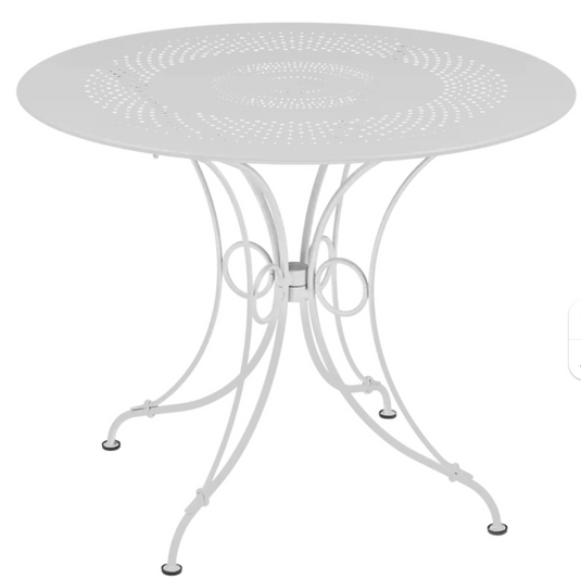 White Fermob 1900 outdoor table with 96cm diameter, metal design, perfect for outdoor garden or patio furniture.
