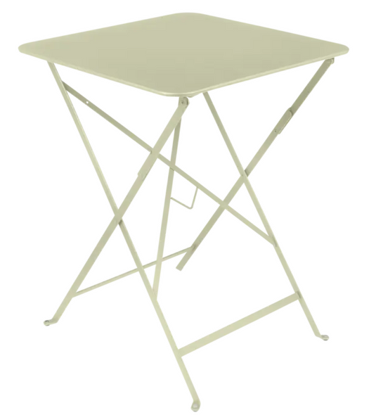 Willow green Fermob metal foldable bistro table measuring 57x57 inches, outdoor cafe style with a compact, portable design.
